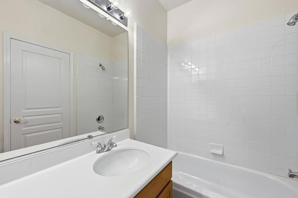 1359 Sparrow Road Carlsbad, CA 92011 - Photo 23 of 43 a bathroom with a sink and a bathtub