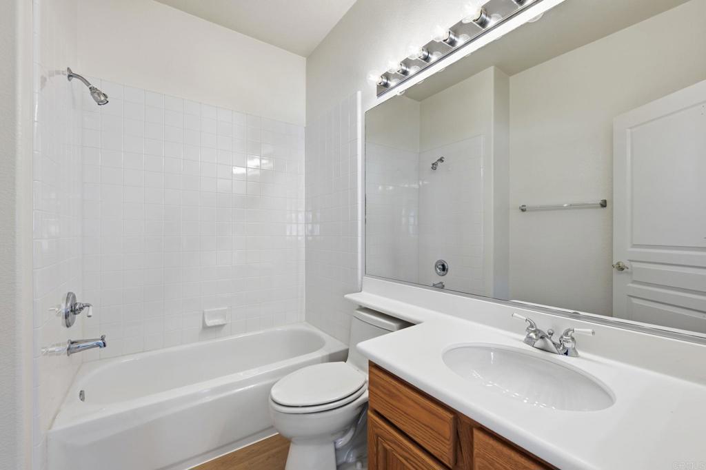 1359 Sparrow Road Carlsbad, CA 92011 - Photo 31 of 43 a bathroom with a sink toilet and shower