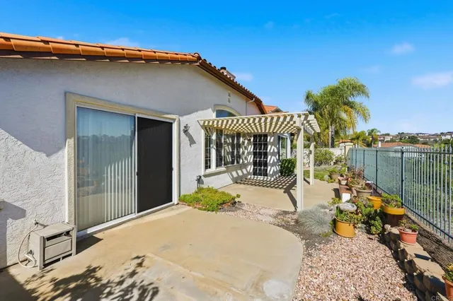 a view of a town with mountains in the background