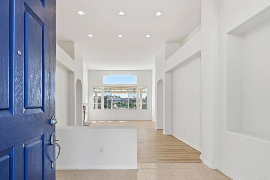 1359 Sparrow Road Carlsbad, CA 92011 - Photo 5 of 43 a view of an empty room with a window