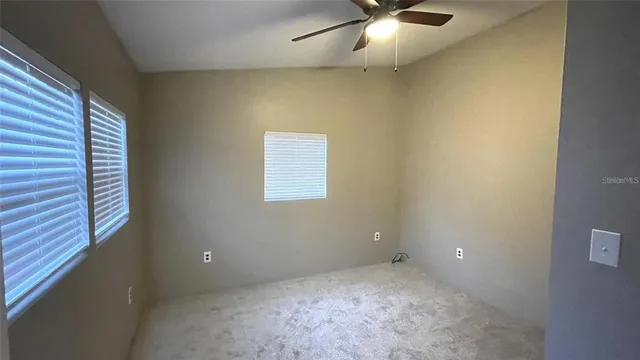 en empty room with a window