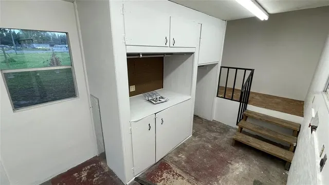 a view of hallway with washer and dryer