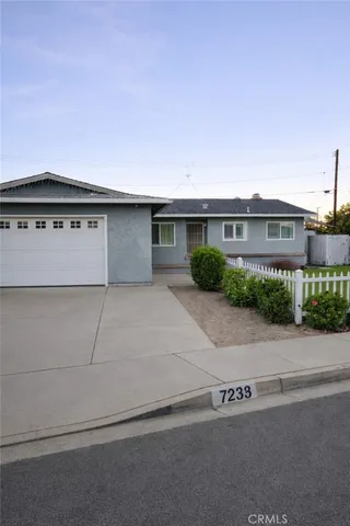front view of a house with a street