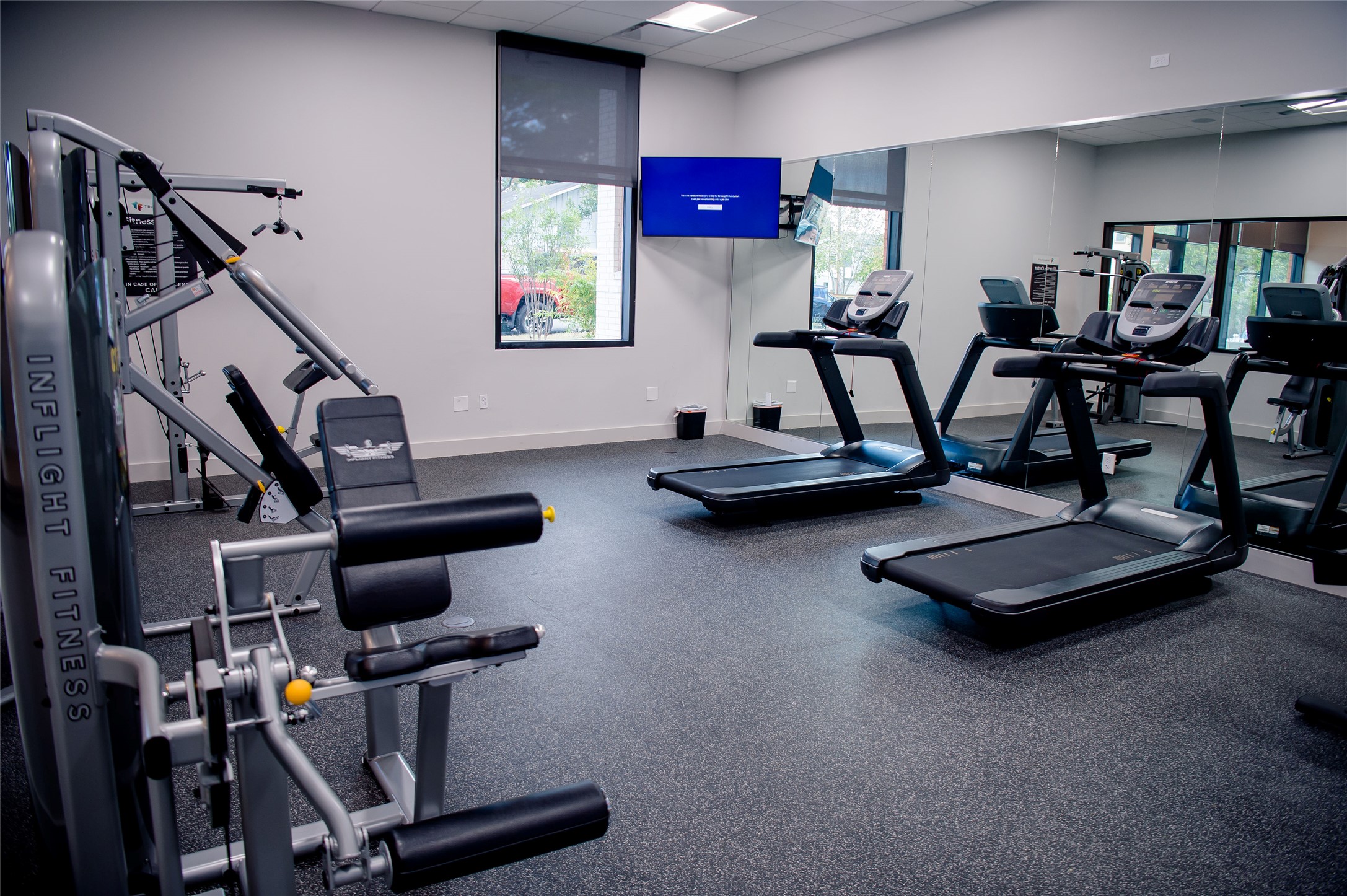 5310 Helen Street, Unit STUDIO Austin, TX 78751 - Photo 6 of 23 a view of a room with gym equipment