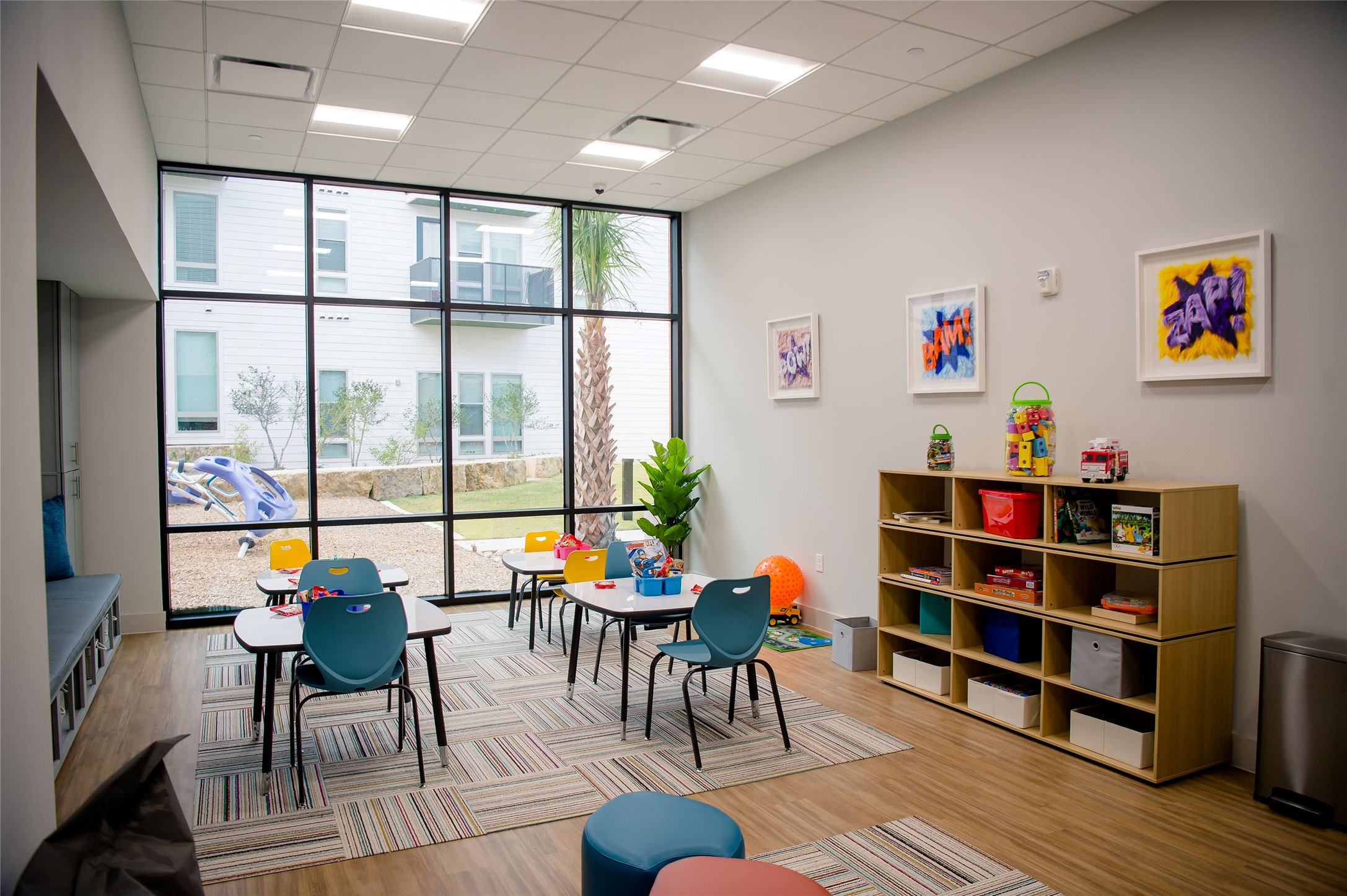 5310 Helen Street, Unit STUDIO Austin, TX 78751 - Photo 7 of 23 a reading room with furniture wooden floor and a large window