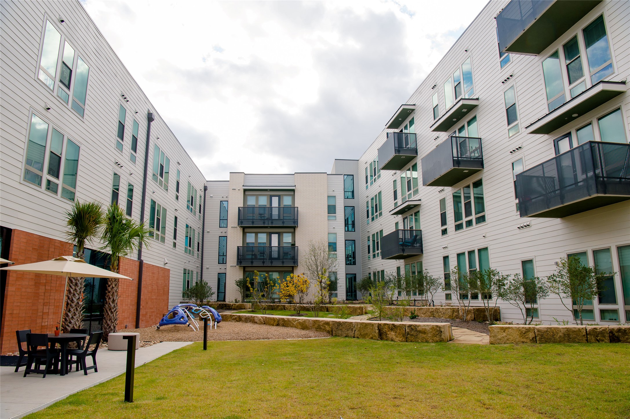 5310 Helen Street, Unit STUDIO Austin, TX 78751 - Photo 8 of 23 a view of a building with swimming pool