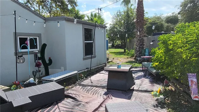 a house view with a outdoor space