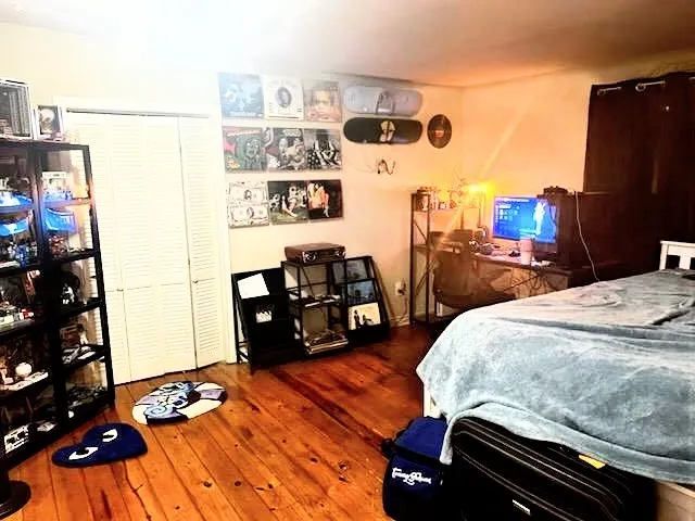 a living room with lots of furniture and kitchen view