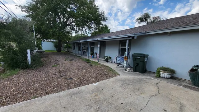a view of a garage with a patio