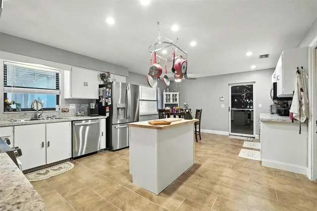 a view of a dining room with furniture