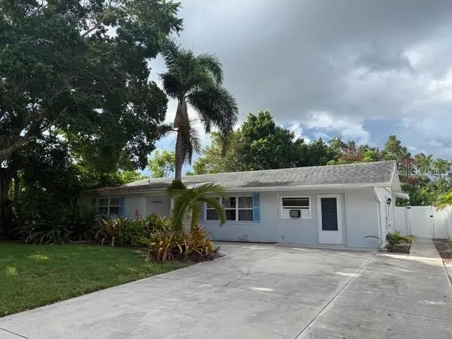 front view of a house with a patio
