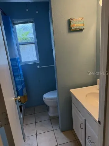 a view of a swimming pool with a yard