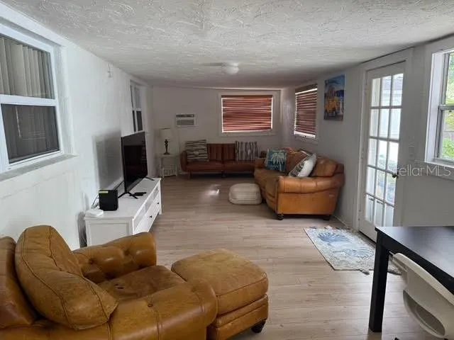 a view of a house with yard and garden