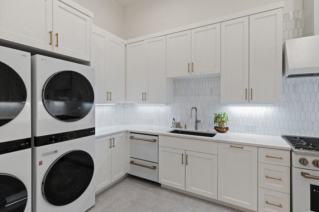 7117 Davenport Divide Road Austin, TX 78738 - Photo 34 of 40 Prep Kitchen Modern cabinetry and appliances create a streamlined and functional space.