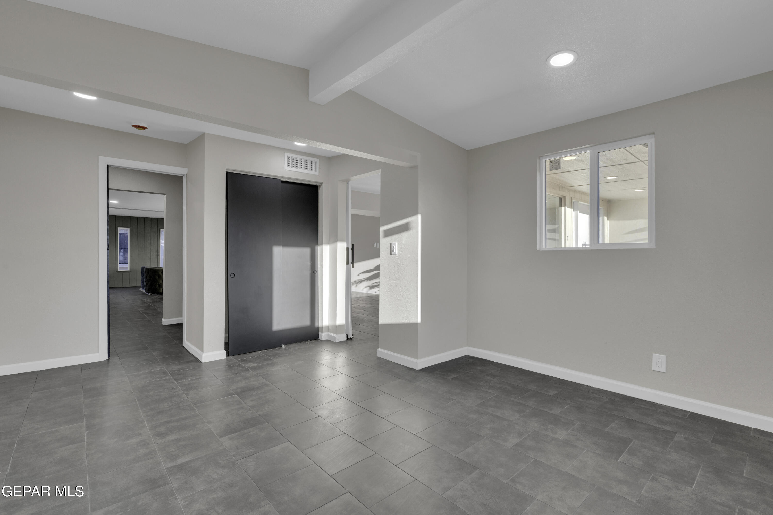 7125 Banana Tree Lane El Paso, TX 79915 - Photo 12 of 62 an empty room with windows and closet