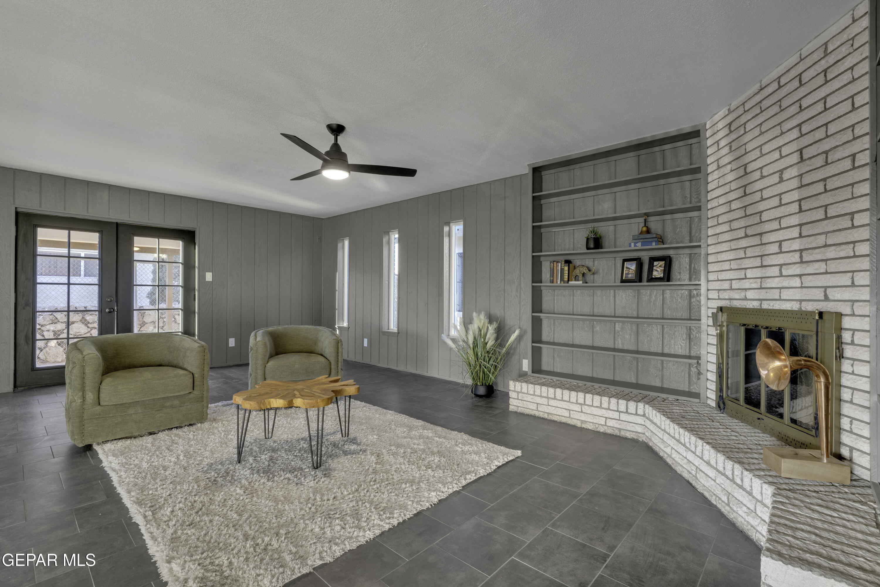 7125 Banana Tree Lane El Paso, TX 79915 - Photo 36 of 62 a living room with furniture and a fireplace