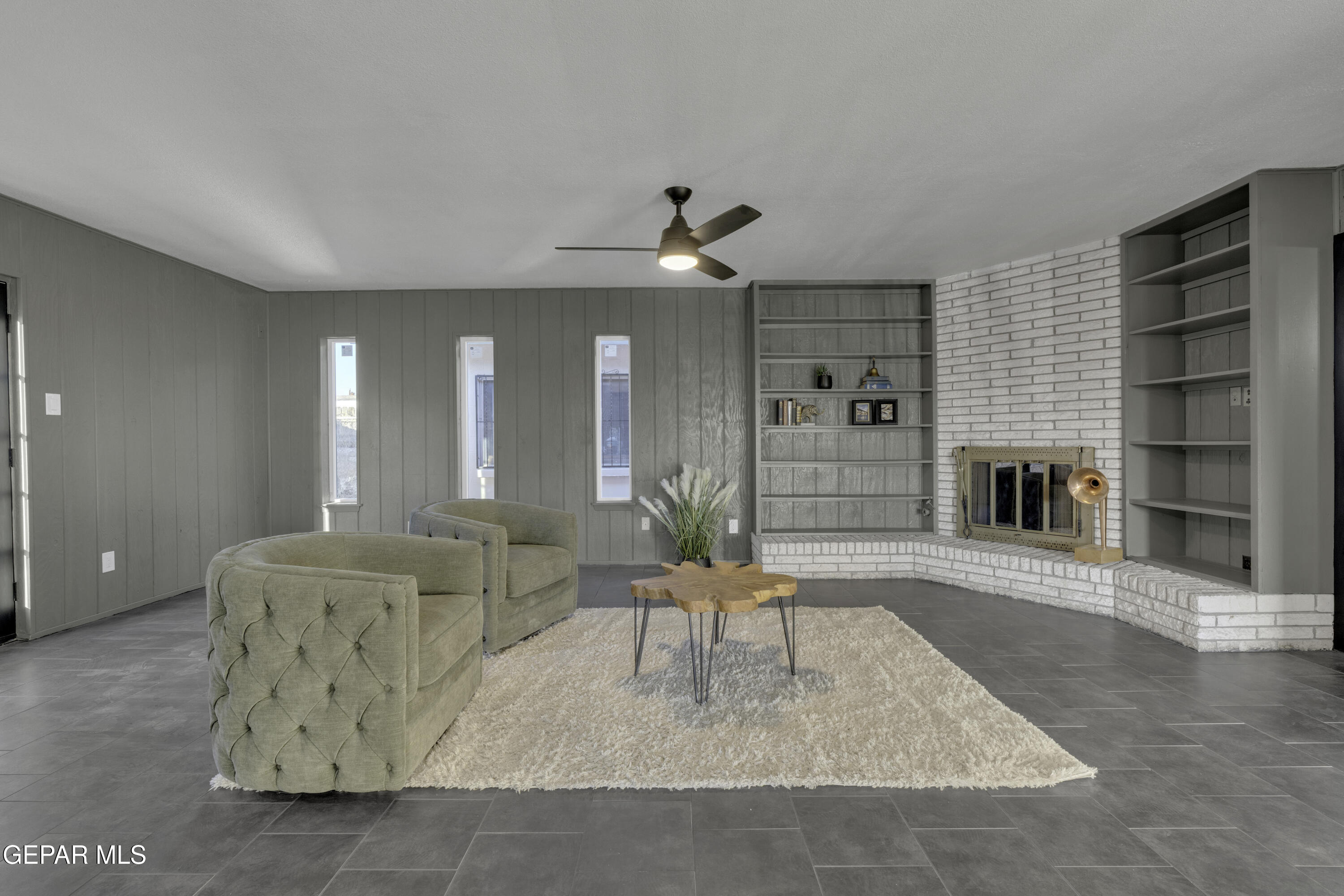 7125 Banana Tree Lane El Paso, TX 79915 - Photo 37 of 62 a living room with furniture and a fireplace