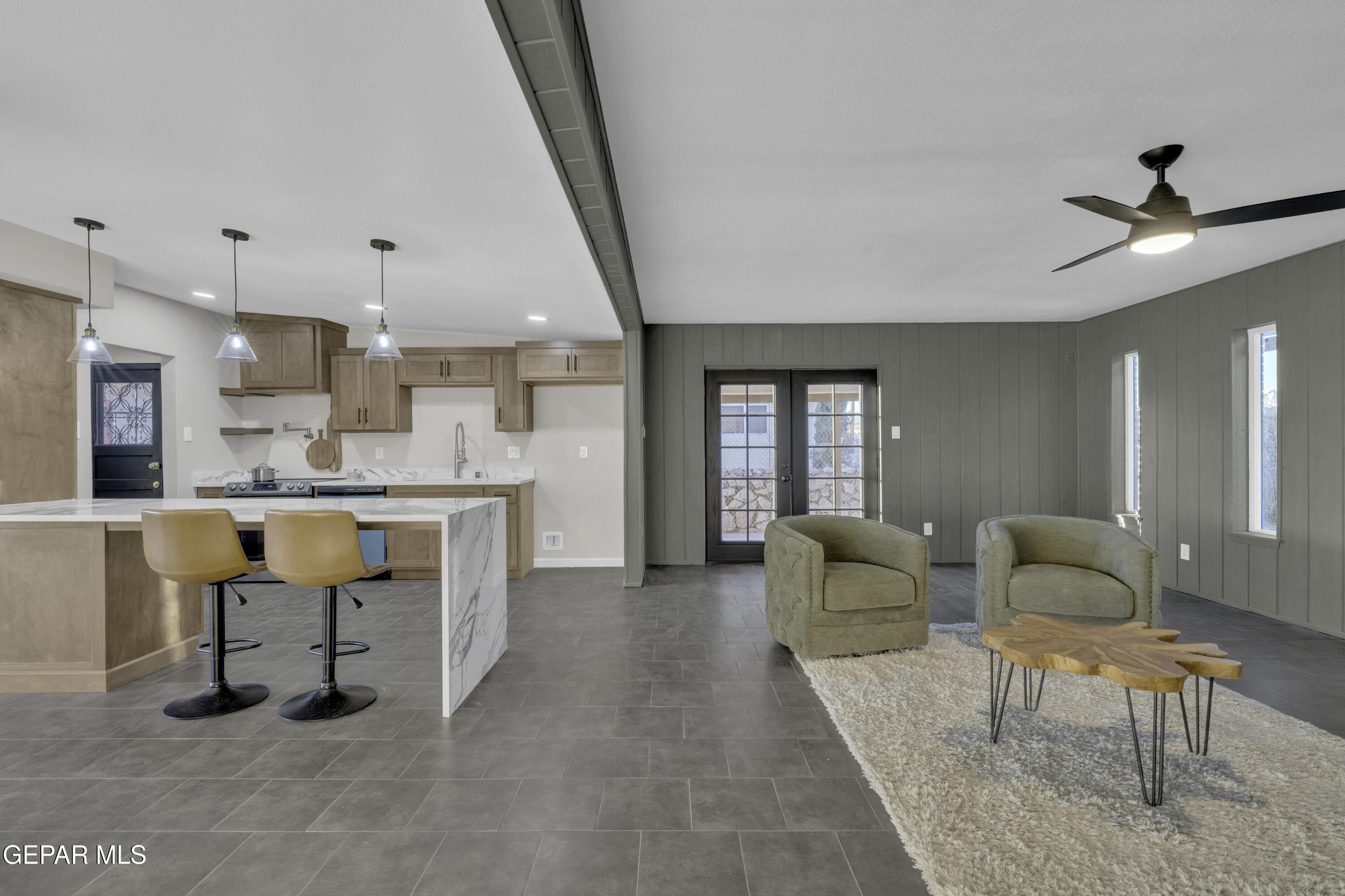 7125 Banana Tree Lane El Paso, TX 79915 - Photo 39 of 62 a living room with furniture and kitchen view