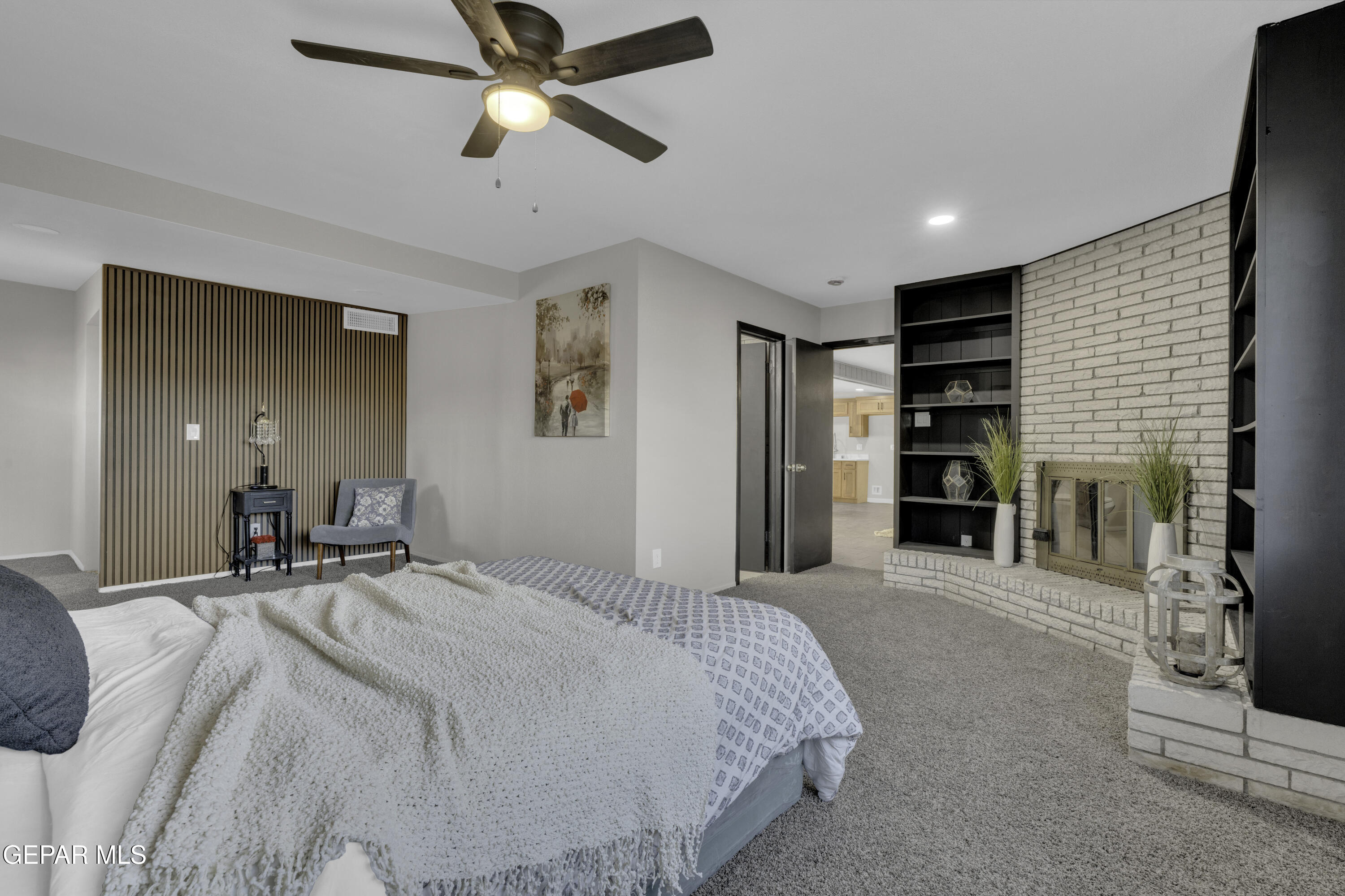 7125 Banana Tree Lane El Paso, TX 79915 - Photo 42 of 62 a bed room with a bed and a ceiling fan