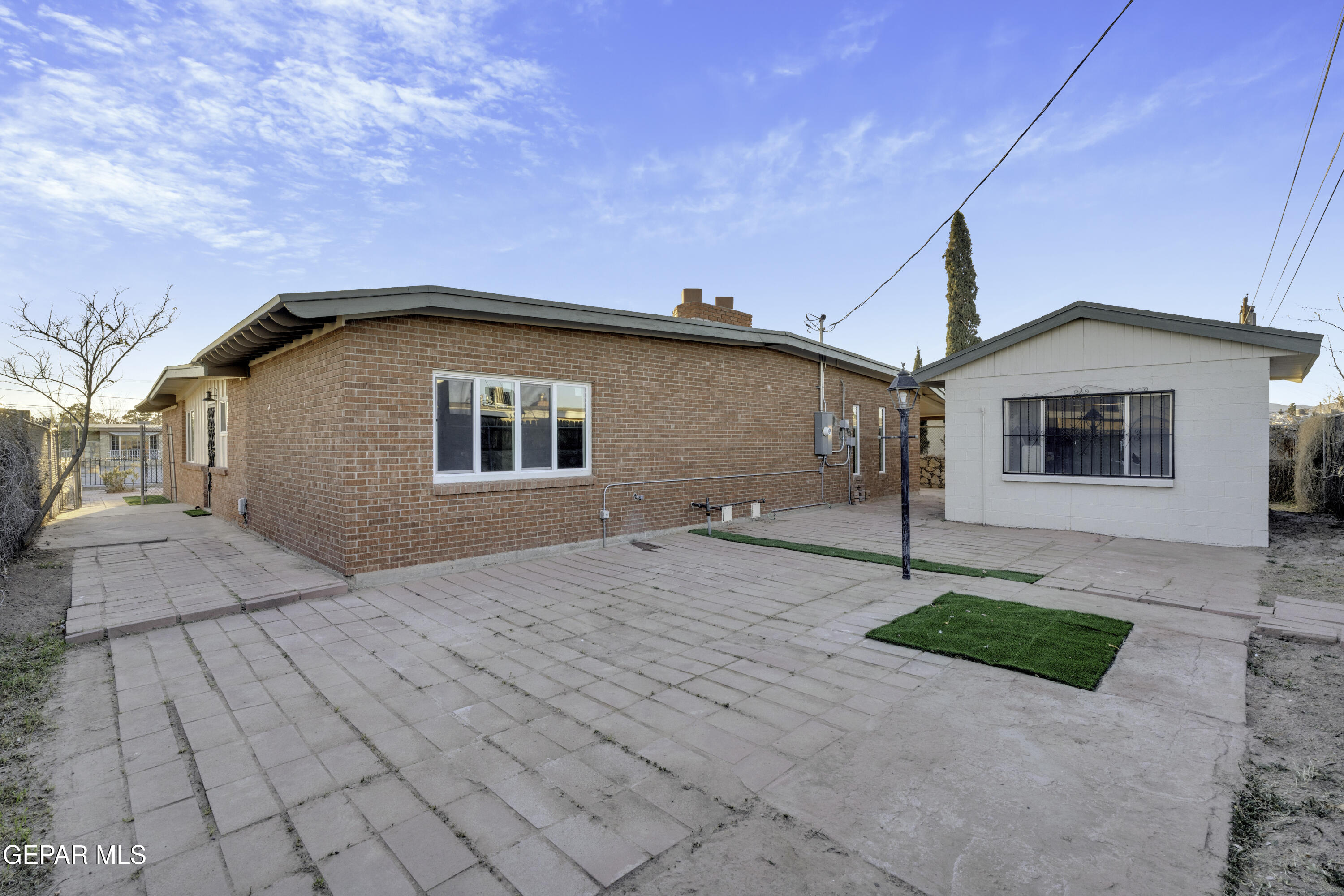 7125 Banana Tree Lane El Paso, TX 79915 - Photo 51 of 62 a front view of a house with a yard and garage