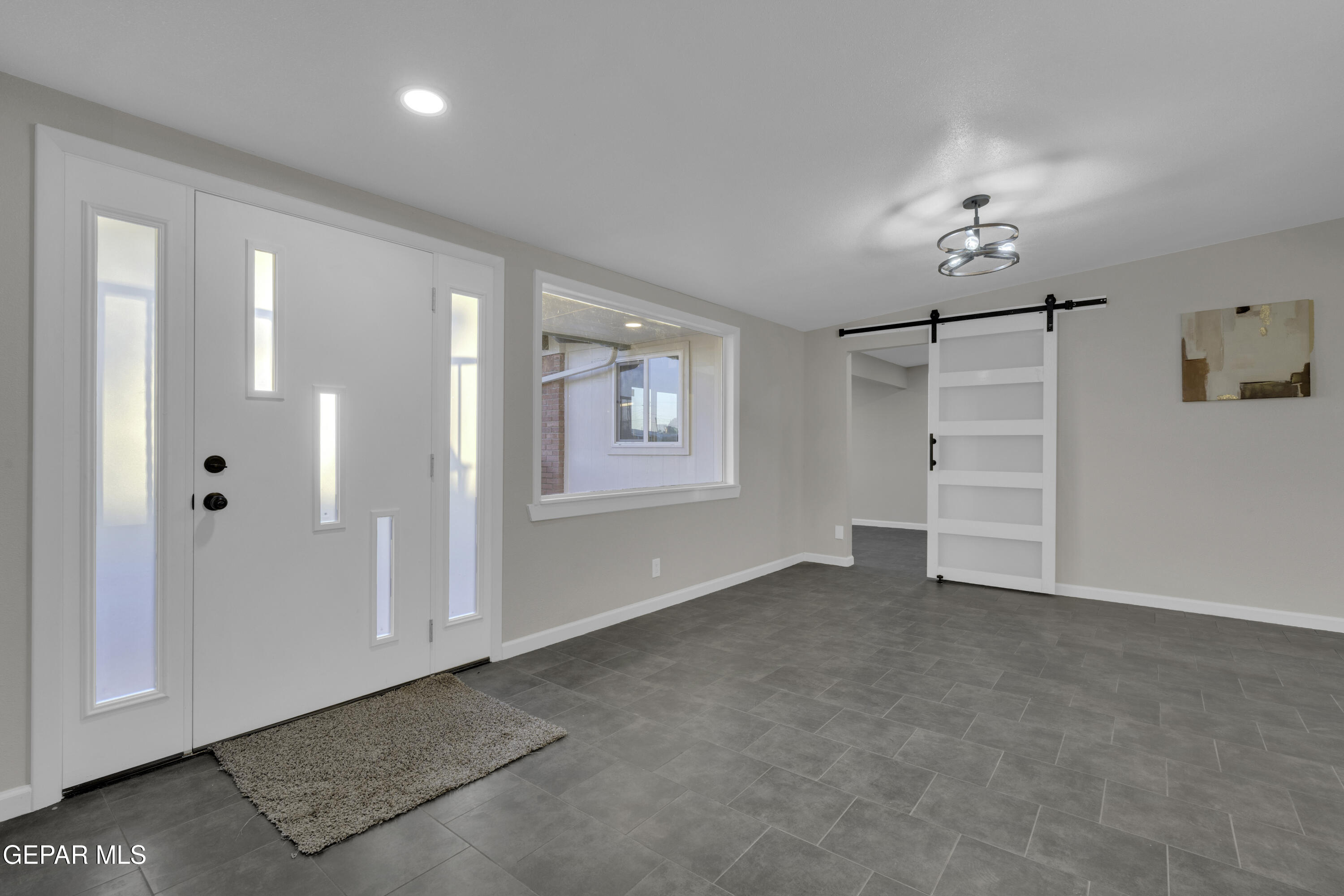 7125 Banana Tree Lane El Paso, TX 79915 - Photo 7 of 62 a view of an empty room with a window