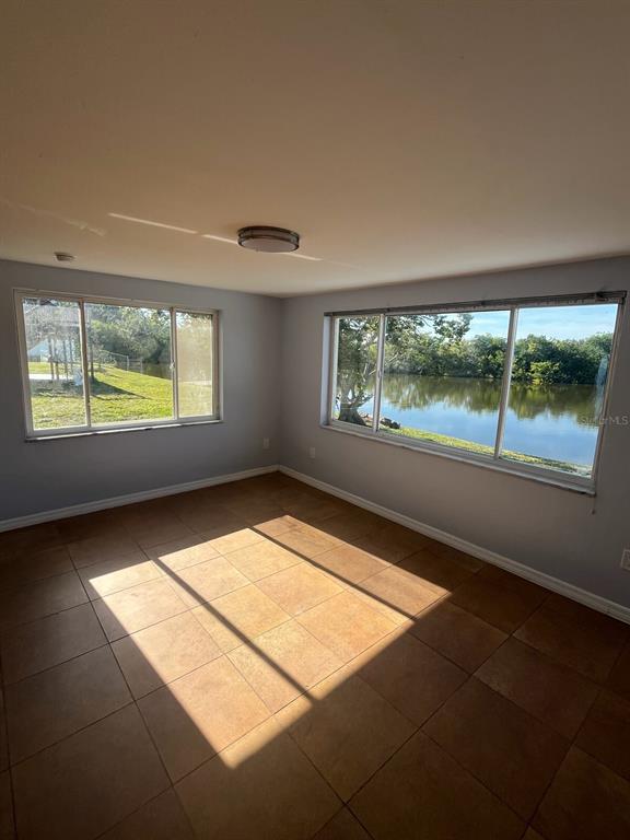 3631 Grayton Drive New Port Richey, FL 34652 - Photo 13 of 42 a view of an empty room with a window
