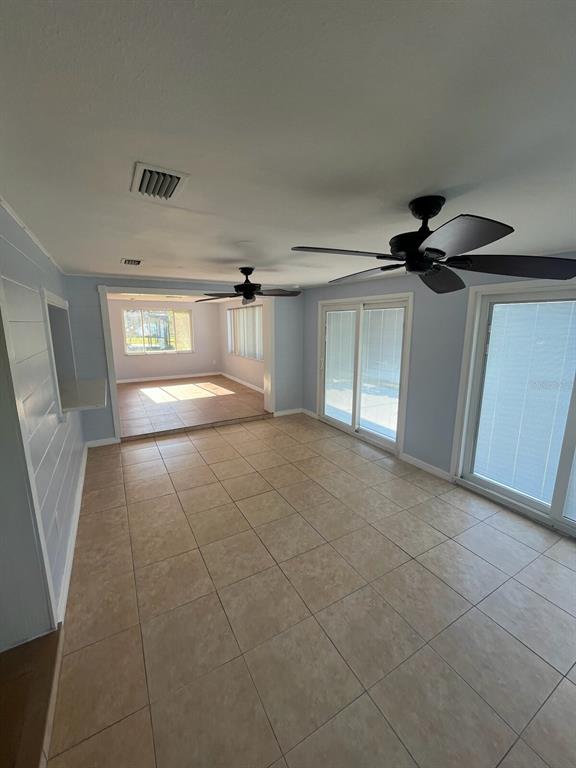 3631 Grayton Drive New Port Richey, FL 34652 - Photo 15 of 42 a view of empty room with wooden floor