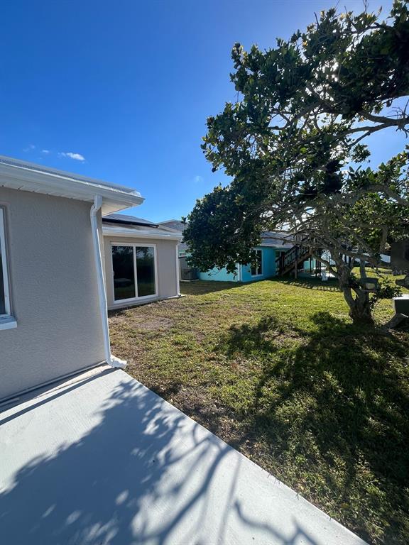3631 Grayton Drive New Port Richey, FL 34652 - Photo 37 of 42 a view of a backyard with large trees