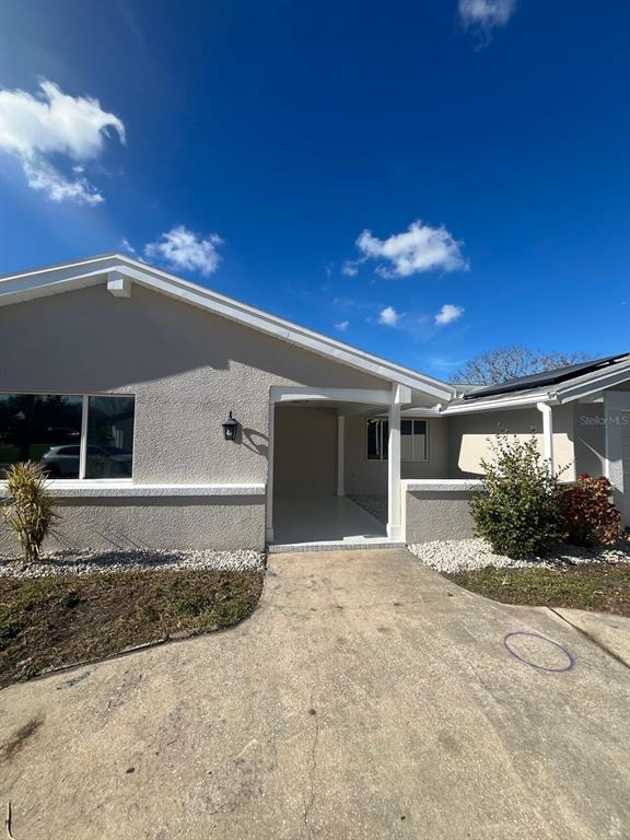 3631 Grayton Drive New Port Richey, FL 34652 - Photo 40 of 42 a view of a house with a yard