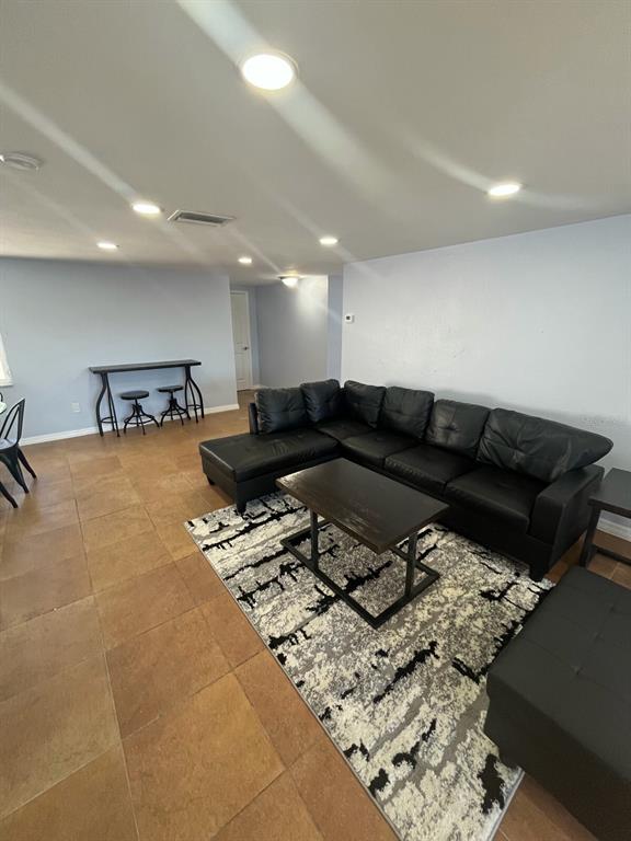 3631 Grayton Drive New Port Richey, FL 34652 - Photo 4 of 42 a living room with furniture and a couch