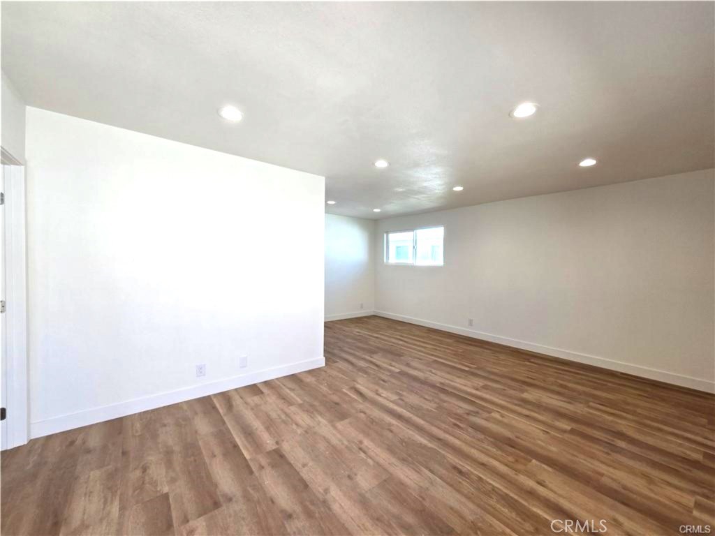 7581 Fillmore Drive, Unit A Buena Park, CA 90620 - Photo 5 of 5 a view of empty room with wooden floor
