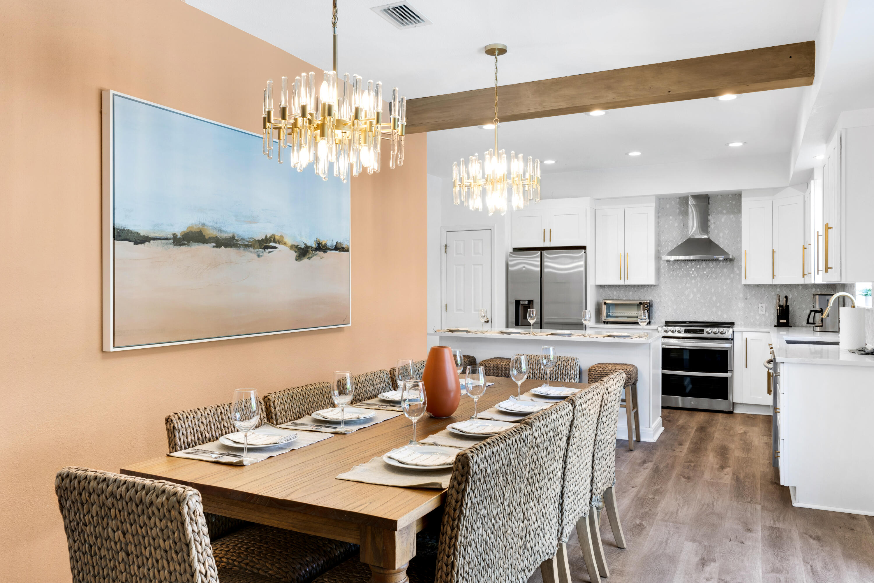 4621 Paradise Isle Destin, FL 32541 - Photo 12 of 65 a kitchen with stainless steel appliances kitchen island granite countertop a sink and a refrigerator
