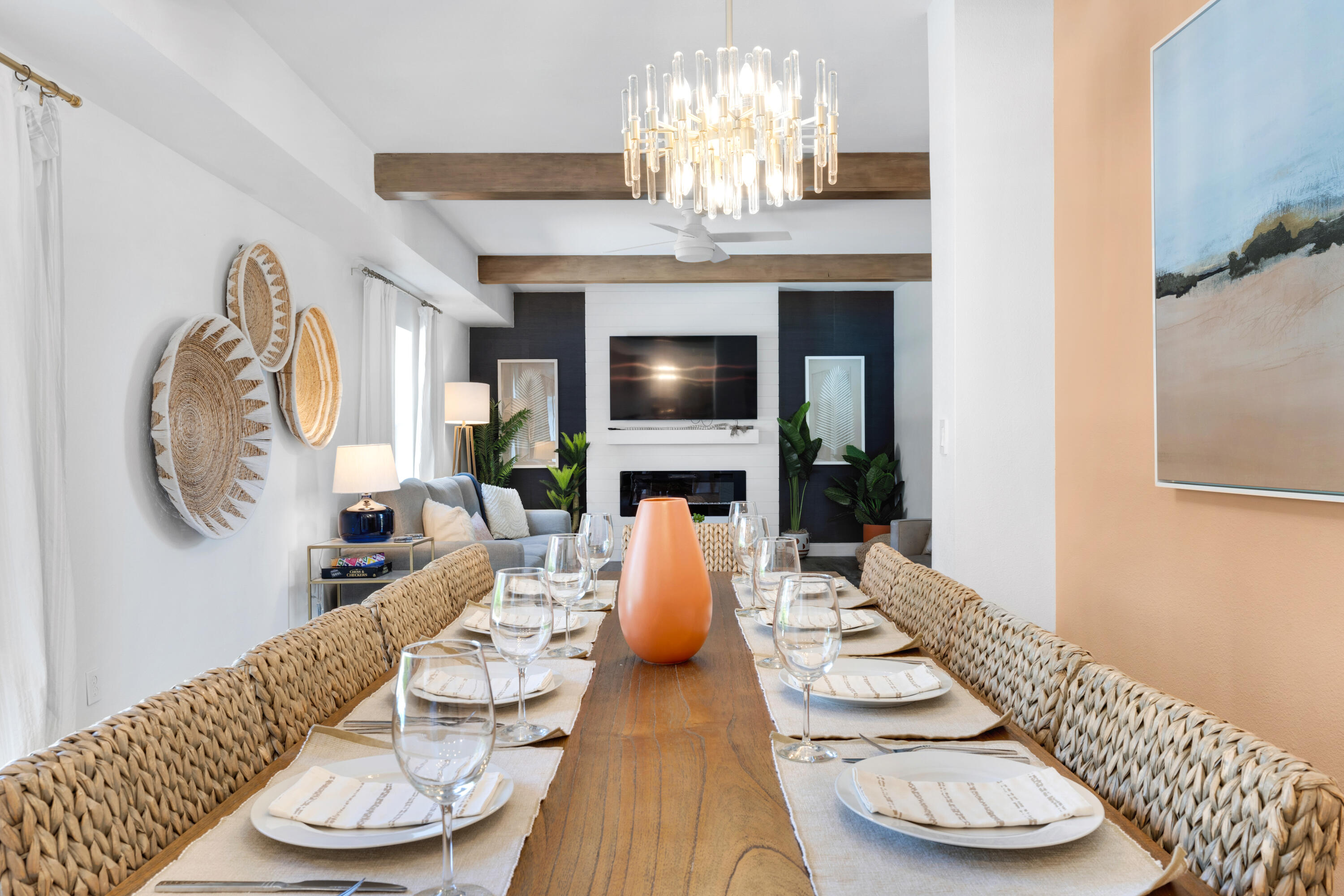 4621 Paradise Isle Destin, FL 32541 - Photo 19 of 65 a living room with furniture a fireplace and a chandelier