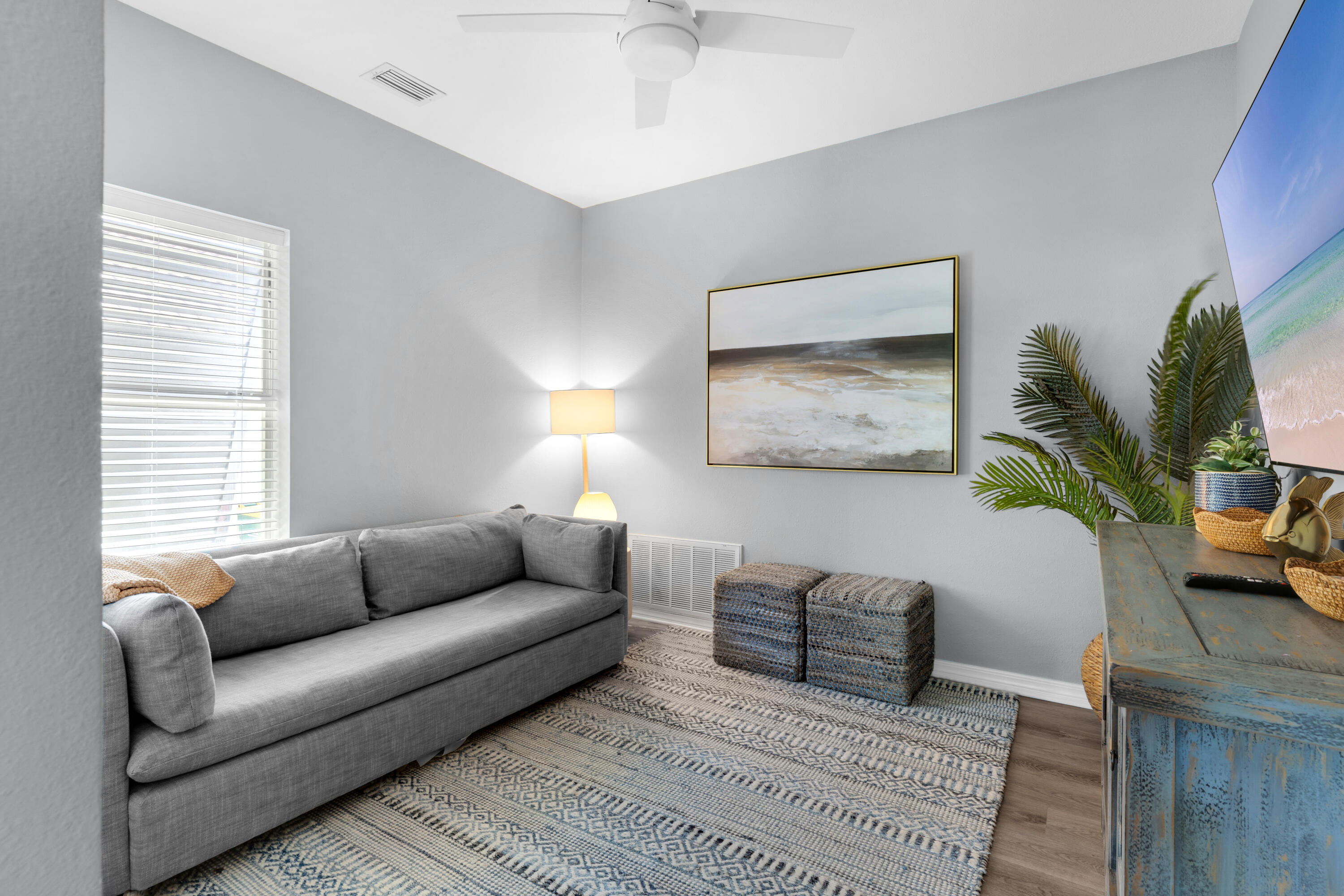 4621 Paradise Isle Destin, FL 32541 - Photo 20 of 65 a living room with furniture plant and a window