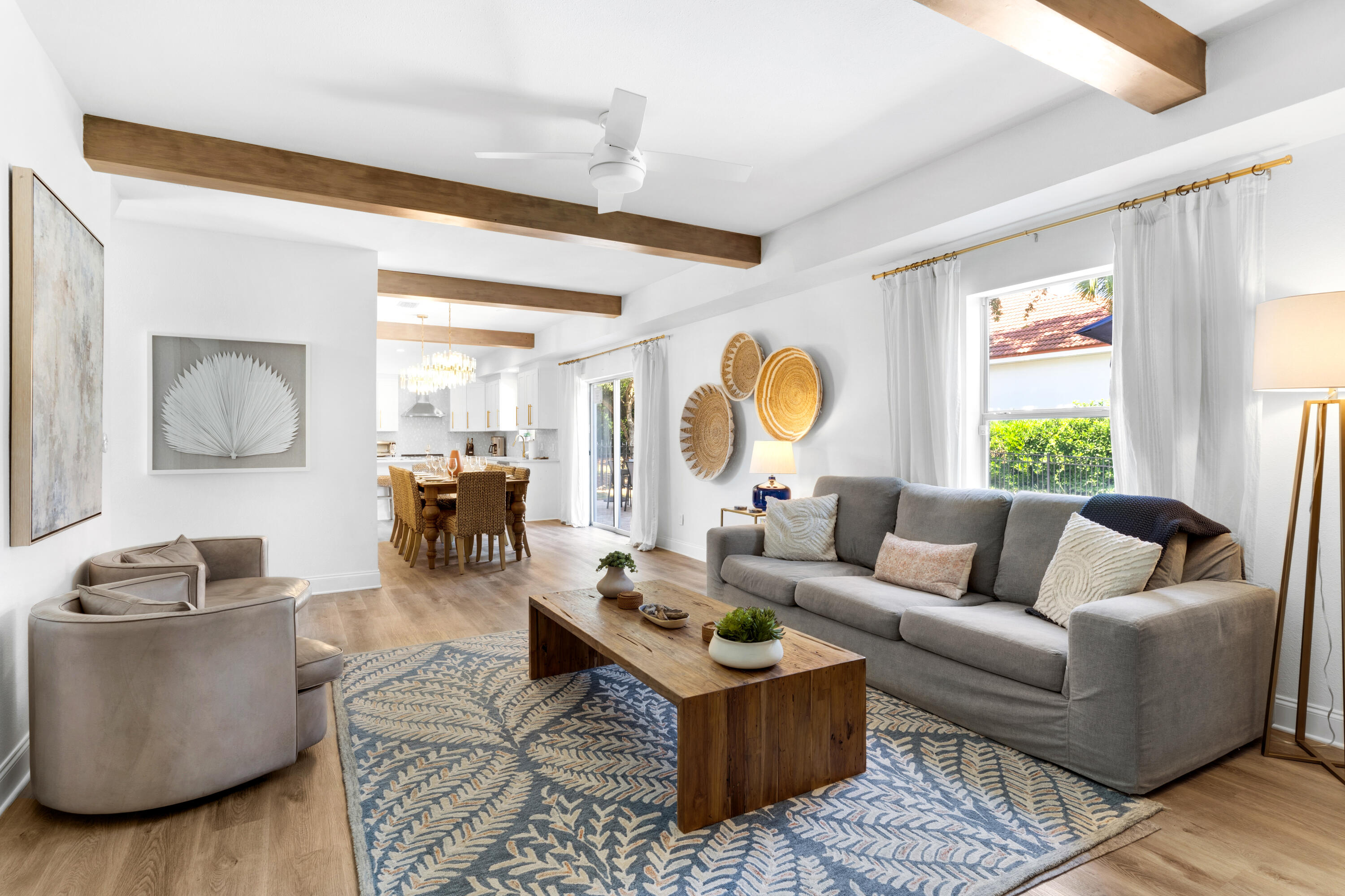 4621 Paradise Isle Destin, FL 32541 - Photo 23 of 65 a living room with furniture and a large window