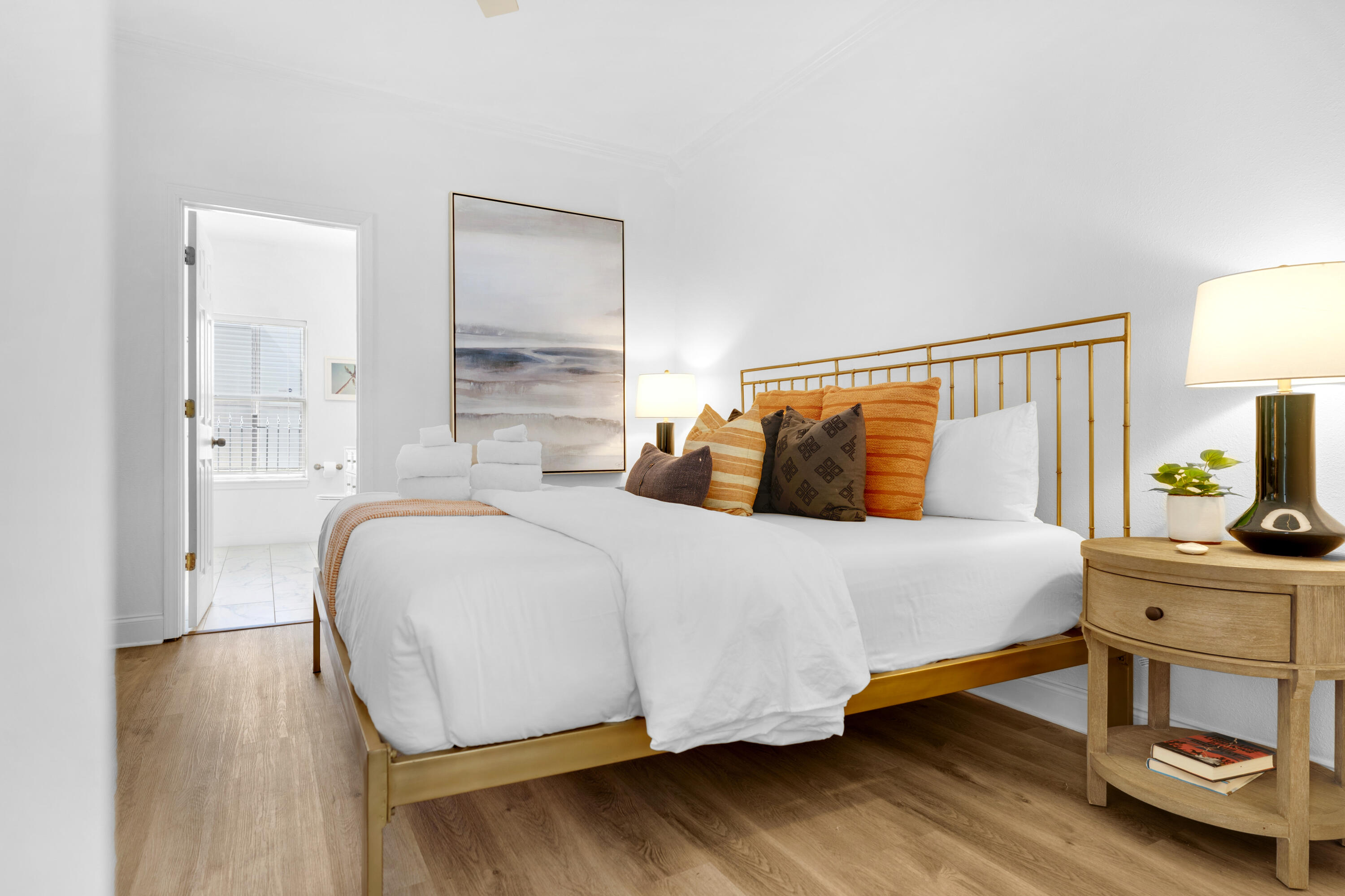 4621 Paradise Isle Destin, FL 32541 - Photo 31 of 65 a bedroom with a bed and wooden floor