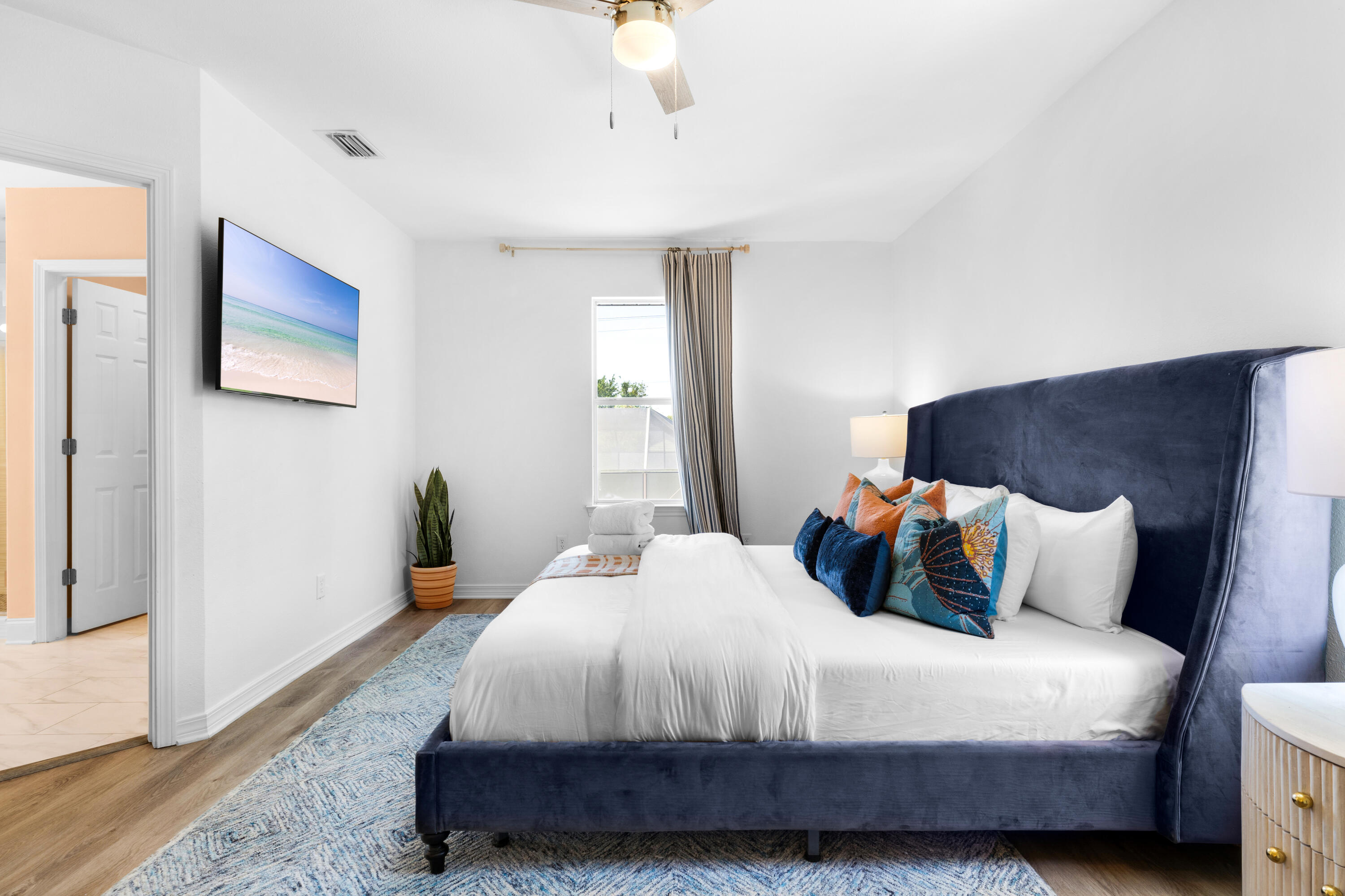 4621 Paradise Isle Destin, FL 32541 - Photo 35 of 65 a bedroom with a bed and a window