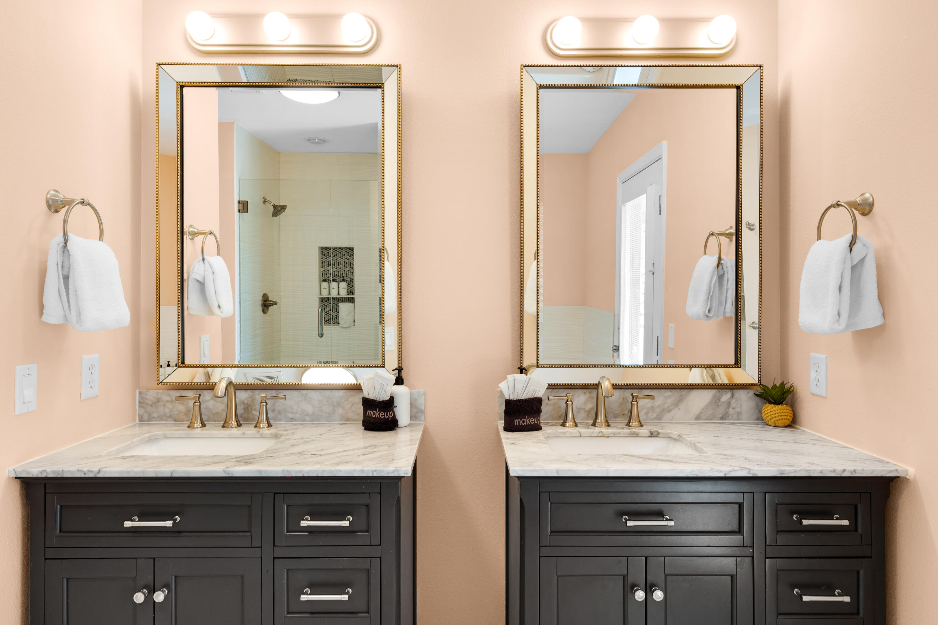 4621 Paradise Isle Destin, FL 32541 - Photo 38 of 65 a bathroom with a granite countertop sink vanity and mirror