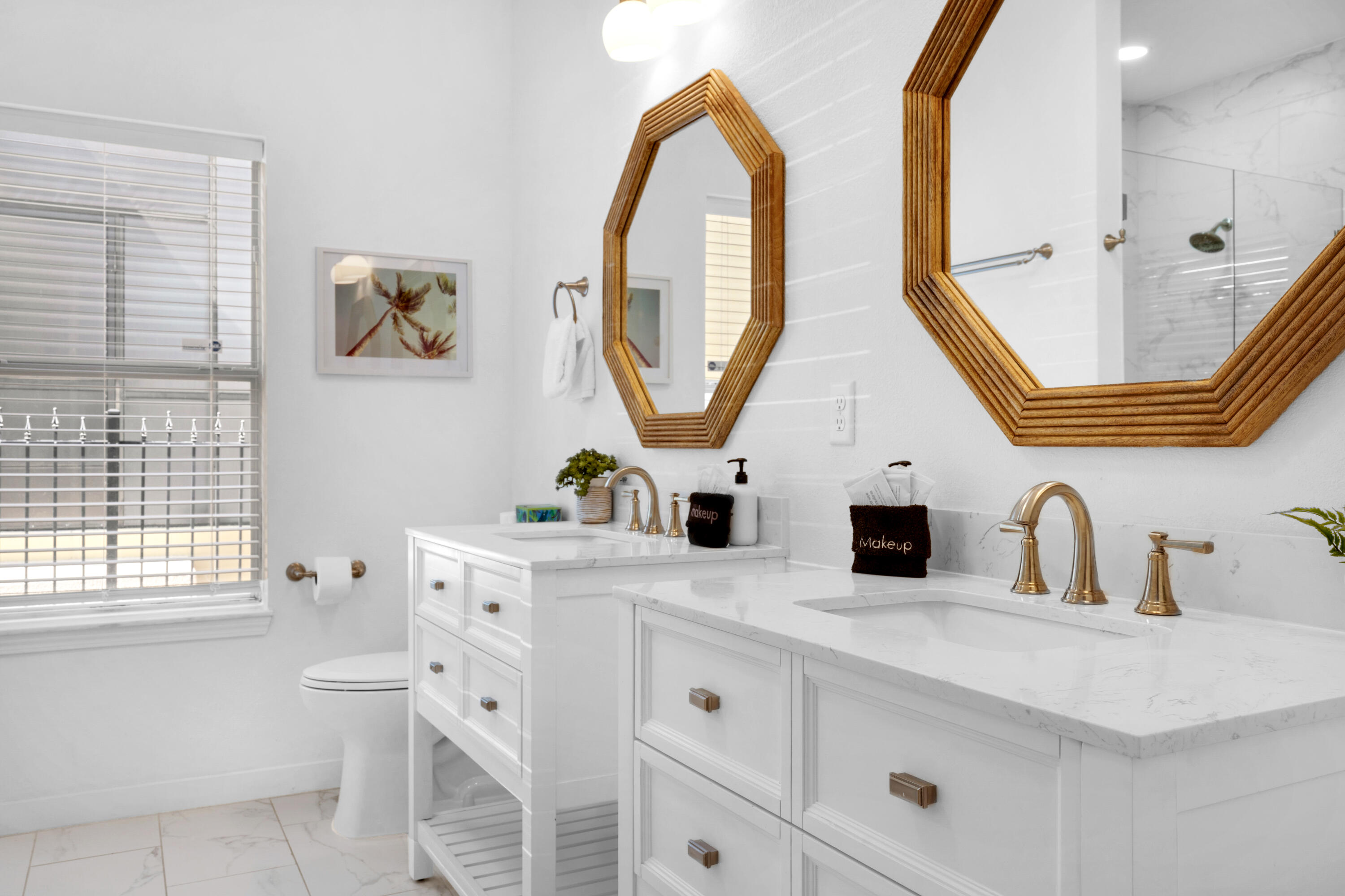 4621 Paradise Isle Destin, FL 32541 - Photo 48 of 65 a bathroom with a double vanity sink and a mirror