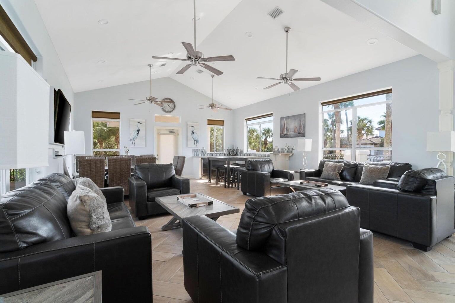 4621 Paradise Isle Destin, FL 32541 - Photo 62 of 65 a living room with furniture a window and a chandelier