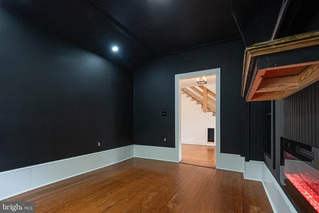 a kitchen with stainless steel appliances sink stove and cabinets