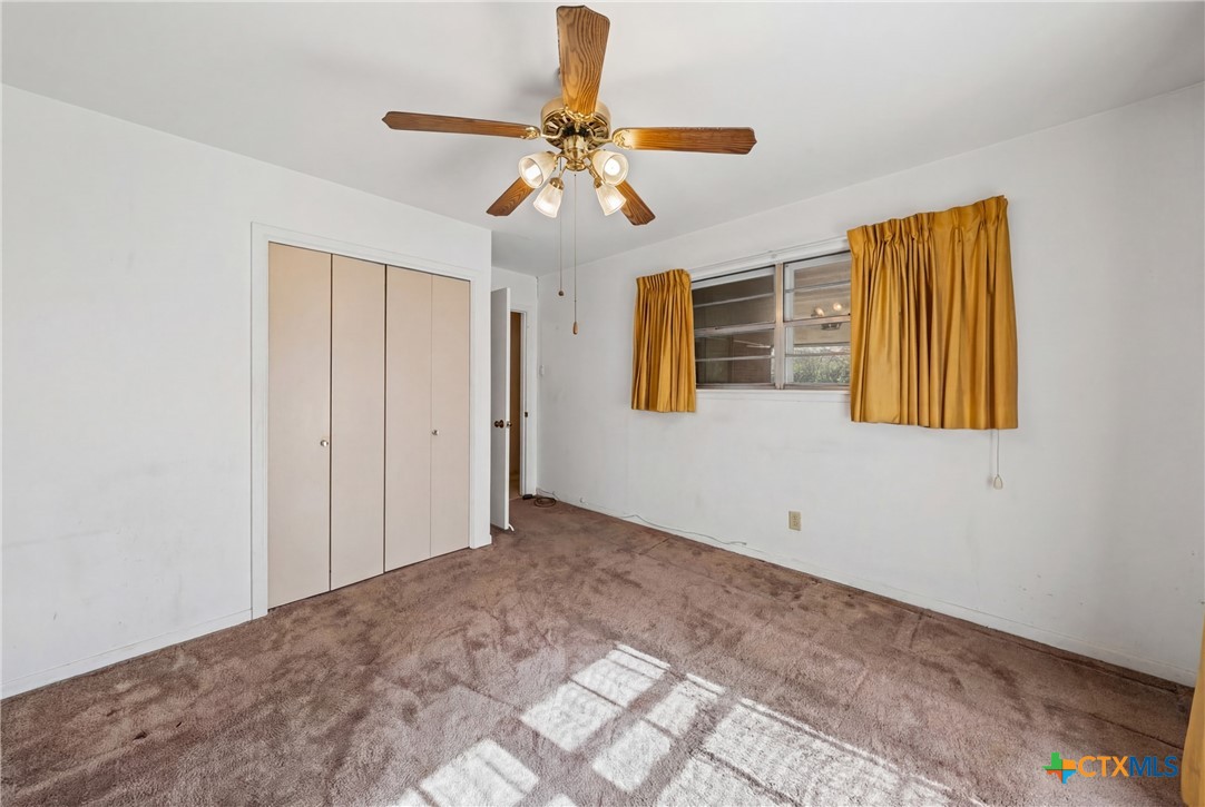 3114 Pecan Drive Temple, TX 76502 - Photo 21 of 32 a view of an empty room with a window
