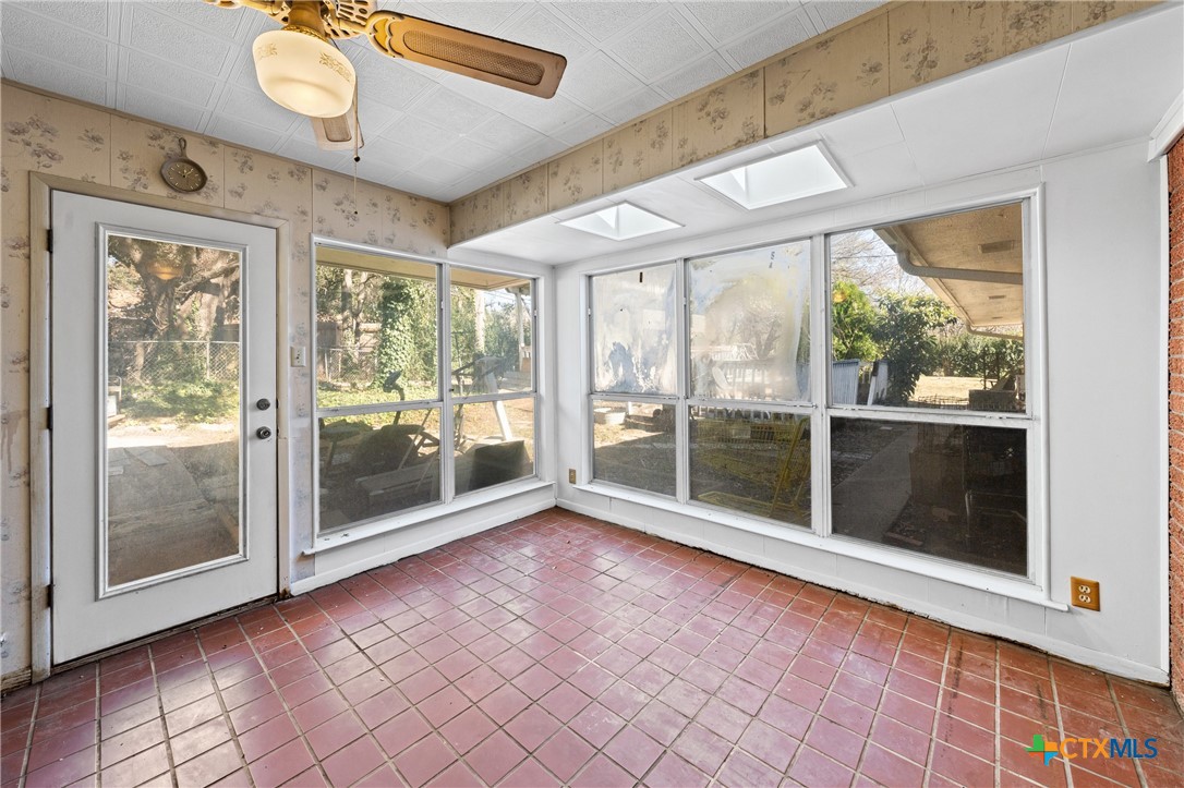 3114 Pecan Drive Temple, TX 76502 - Photo 25 of 32 a view of empty room with wooden floor and fan