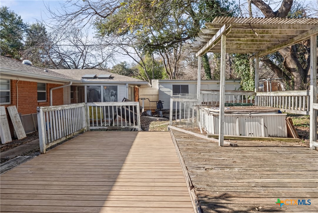 3114 Pecan Drive Temple, TX 76502 - Photo 30 of 32 a view of a house with wooden deck
