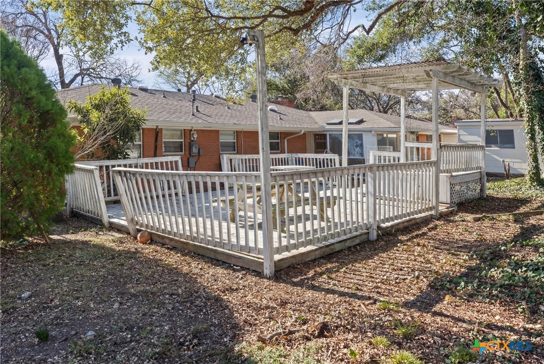 3114 Pecan Drive Temple, TX 76502 - Photo 31 of 32 a view of a house with a small yard and wooden fence