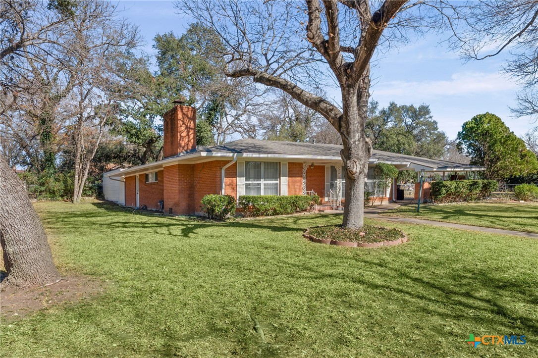 3114 Pecan Drive Temple, TX 76502 - Photo 4 of 32 a view of a house with a yard