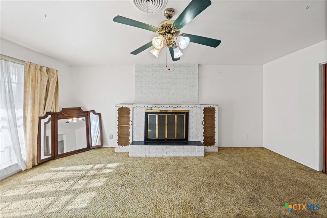 3114 Pecan Drive Temple, TX 76502 - Photo 7 of 32 a view of an empty room with a window