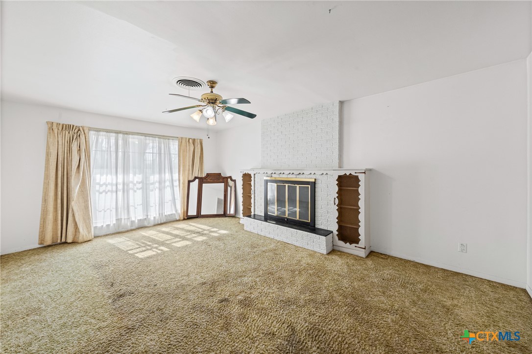 3114 Pecan Drive Temple, TX 76502 - Photo 8 of 32 a view of an empty room with a window