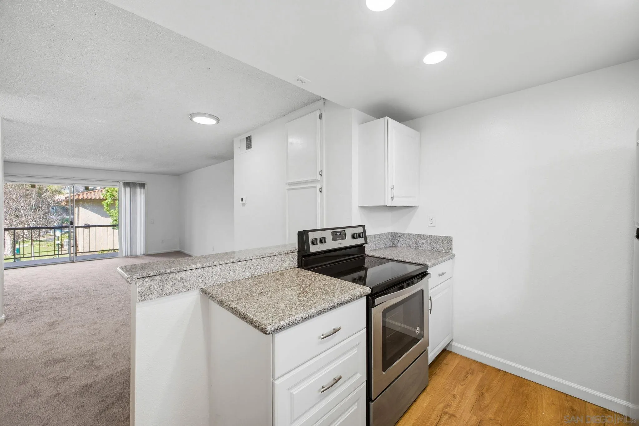 6019 Rancho Mission Road, Unit 204 San Diego, CA 92108 - Photo 15 of 38 Upgraded kitchen with stainless steel appliances