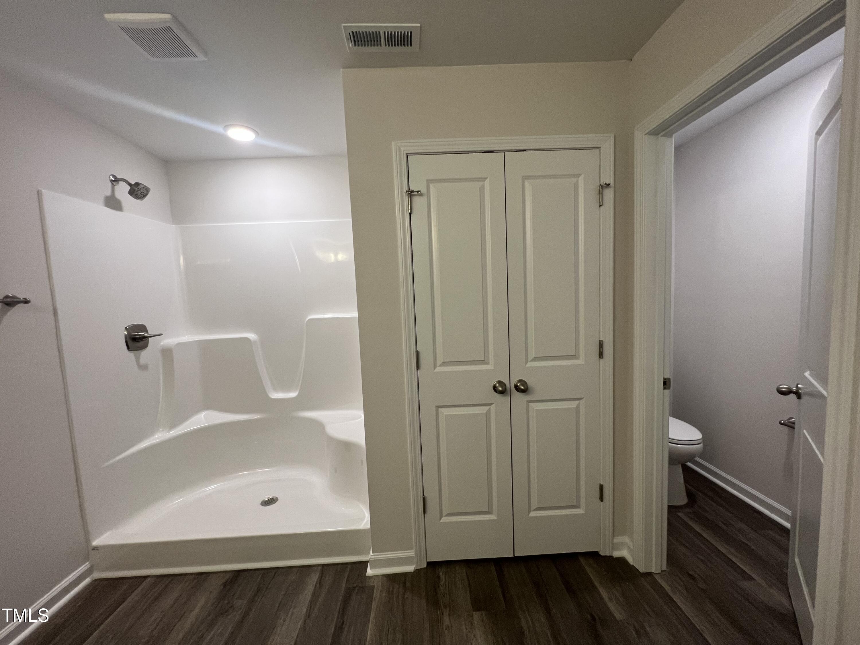 259 Palomo Place Raeford, NC 28376 - Photo 15 of 23 a bathroom with a shower and a tub